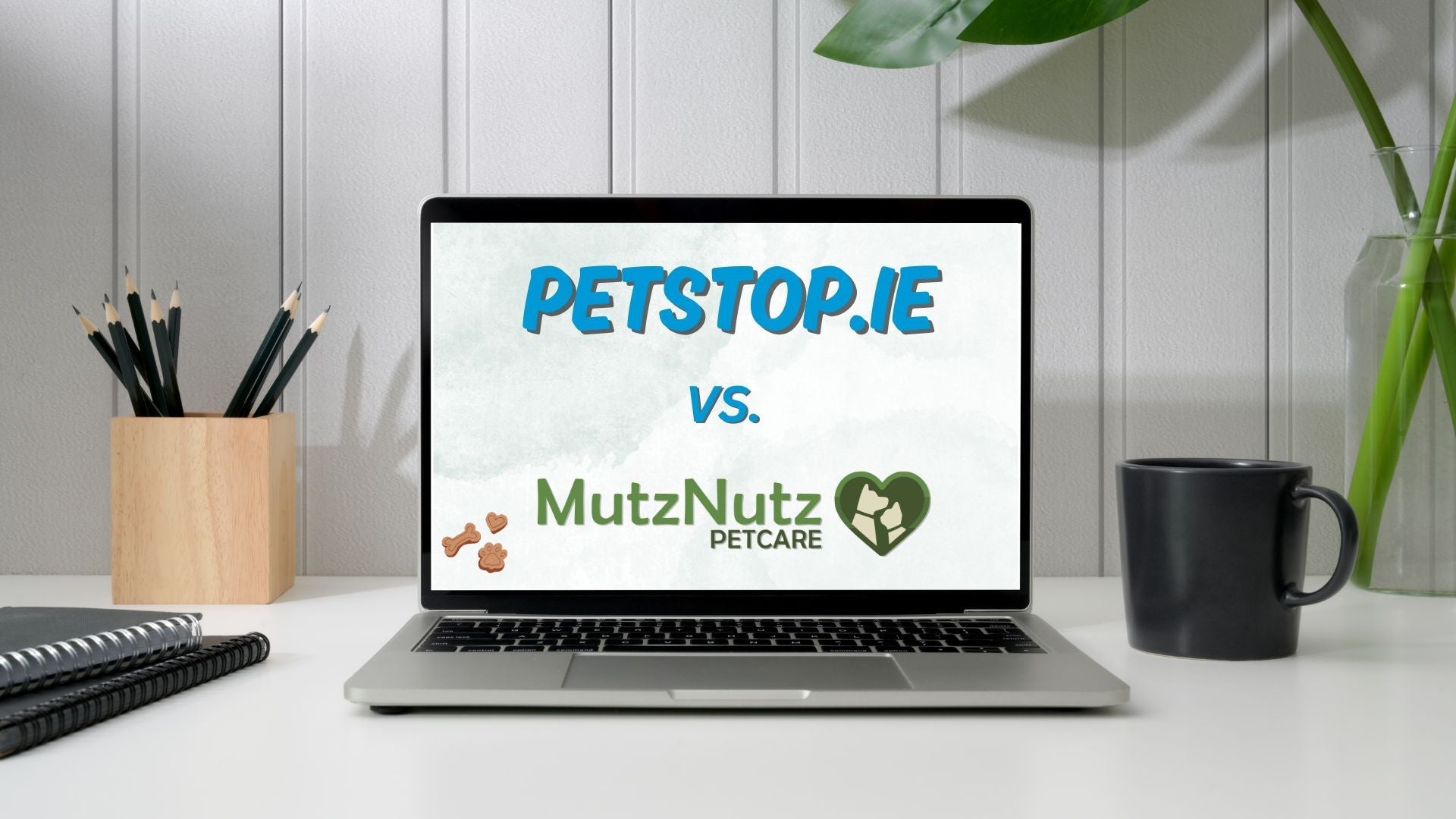 a picture of a laptop with text comparion two pet shops mutznutz and petstop